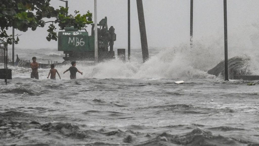 Fierce Tropical Storm Forces Mass Exodus in the Philippines