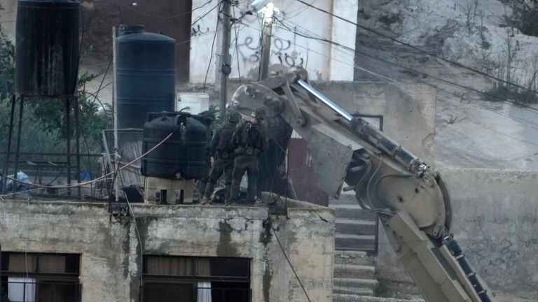 Footage Shows Israeli Soldiers Pushing Dead Bodies from Rooftop in West Bank Raid