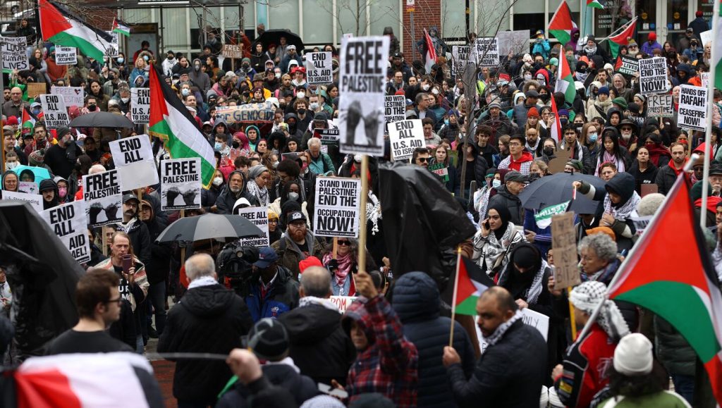 Man Sets Arm Ablaze as Thousands March in U.S. Cities Calling for Gaza Ceasefire