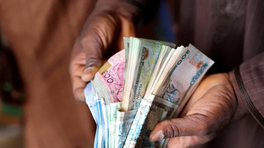 Nigerians Grapple with Deepening Economic Woes as Naira Plummets to Unprecedented Lows 