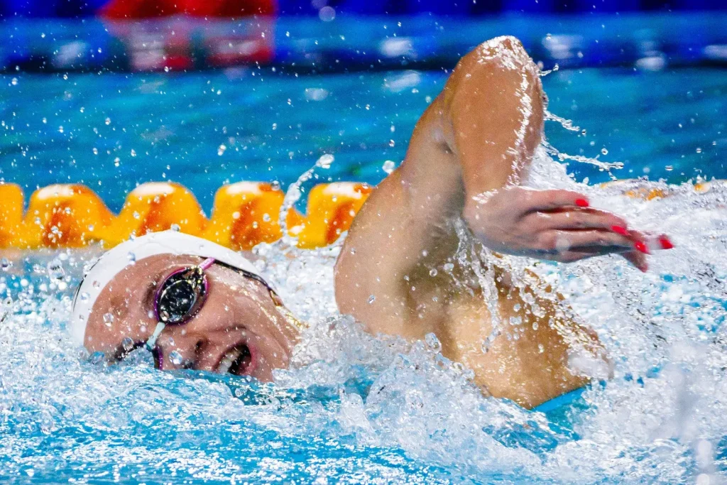 Olympic champion Ariarne Titmus shattered the women's 200m freestyle world record at the Australian Olympic trials in Brisbane.