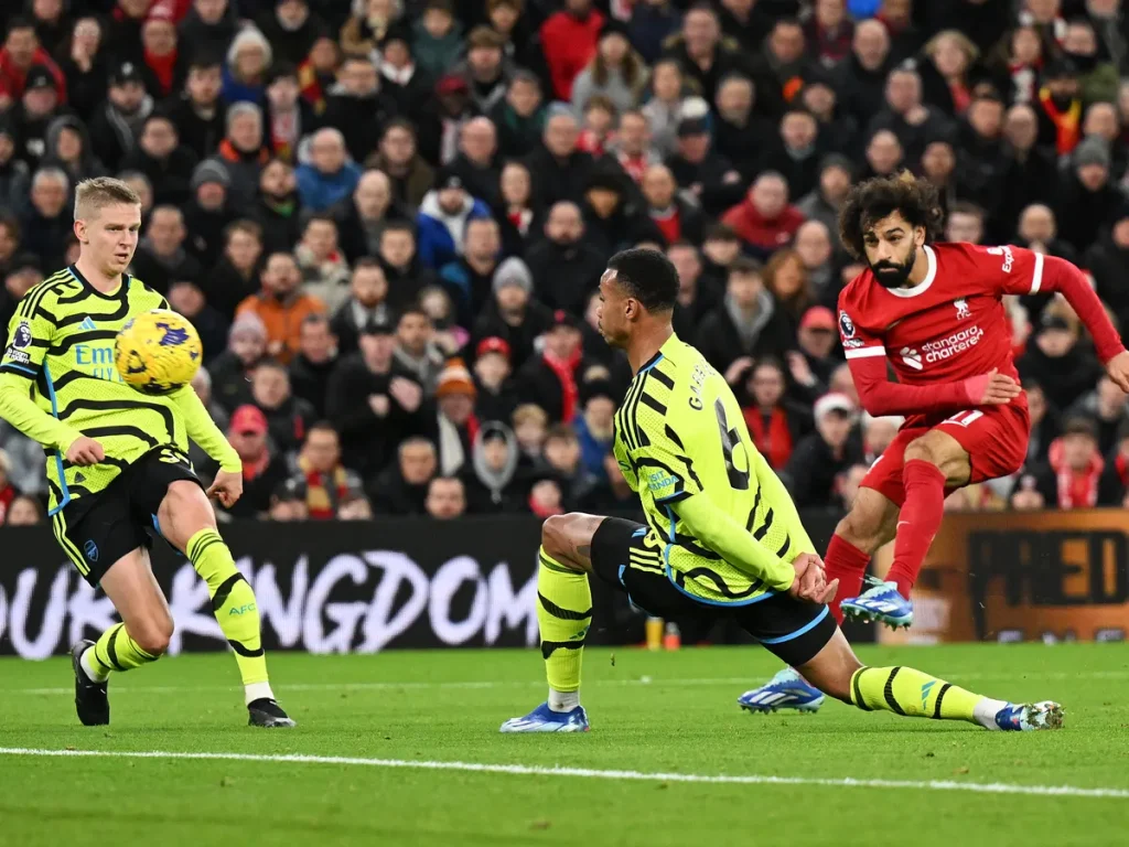 Salah's Stunning Strike Earns Liverpool Draw, but Arsenal Remains Top of Table 
