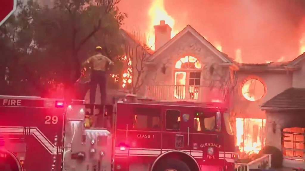 Wildfires in Los Angeles Kill 10, Force Thousands to Flee Homes