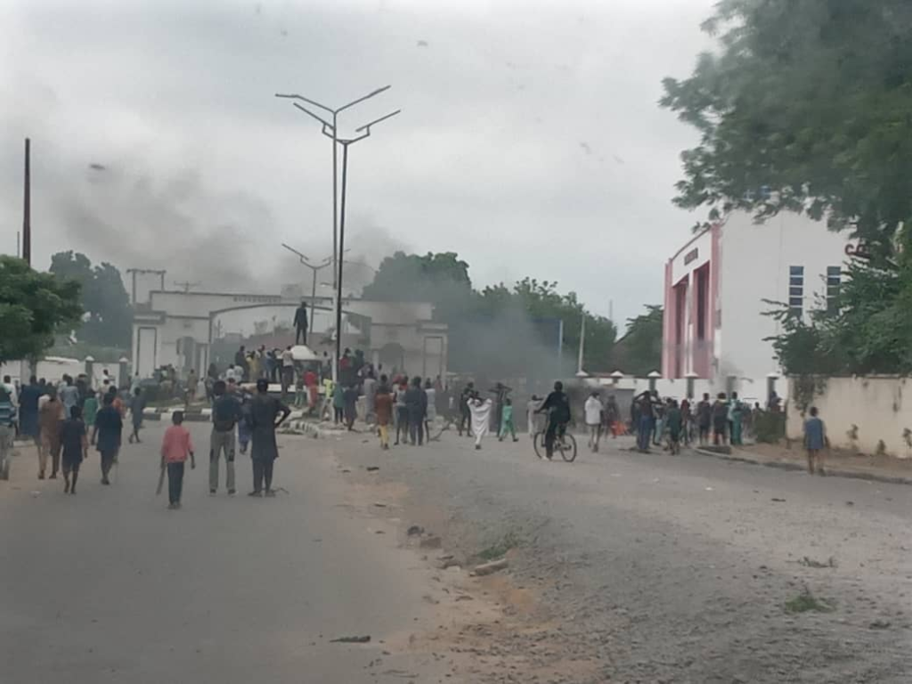 Kano Protesters Light Bonfire Outside Government House
