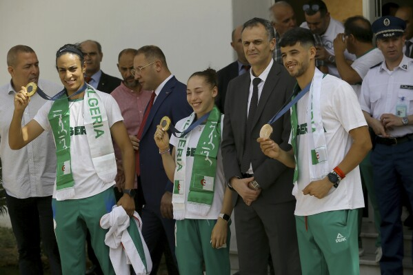 Imane Khelif, Teammates Receive Hero's Welcome After Olympic Victory